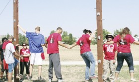 Students get their first taste of activity on the CNCC Challenge Course as they worked on balance and how to “spot” fellow students.