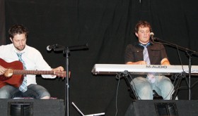 Shea Bramer and Kellen Michael perform earlier this year at the CNCC Foundation Dinner/Dance. Bramer introduced his original song, “We Will Carry On,” written for and about CNCC’s 50th anniversary.