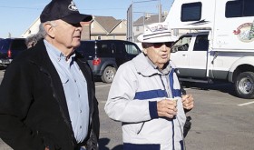 Julius Poole (left) visits with former U.S. Senator Ben Nighthorse Campbell, who is driving the tree to Washington, D.C.