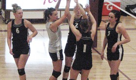 Meeker volleyball players Taylor Neilson, Piper Haney Aly Ridings (2), Kaysyn Chintala (1) and Jordan Brown celebrate after scoring in the regional tournament held last Saturday in Telluride. Although the lady Cowboys did not advance to the state tournament, the team had plenty to celebrate, finishing the league as the No. 4 seed, beating the league champions in the district tournament and finishing second in the region.