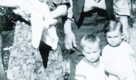 Patty as a baby, held by her mother Annie, with her father Dallas Collins and brothers Dick and Joe.