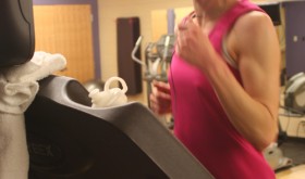 Sarah Ward, who registered for the Boston Marathon last fall and will run in the famous race this April, trains at the recreation center until warmer weather improves road conditions for running.