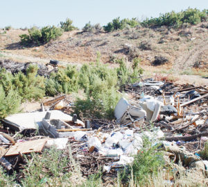 A jumble of discarded furniture, appliances and trash approximately a quarter-mile from the Rangely city limits off Dragon Road is one of dozens of illegal dump sites in the area. Town and county entities have pledged to work with the Bureau of Land Management to clean up the dump sites. A camera system scheduled to be fully installed by next summer will help identify dumpers and assist the Rio Blanco County Sheriff’s Office and the Bureau of Land Management in ticketing those who break the law.