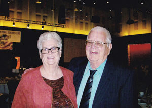 Paul Conrad, left, married his wife, Sharon, right, the same year his 1962 Adams State College Indians football team came back from a 20-0 halftime deficit to beat Northern Illinois University in the Mineral Bowl. The football team was inducted into the Adams State University Hall of Fame last fall, and this photo was taken at that induction.