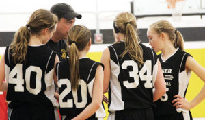 Barone Middle School seventh-grade girls’ coach Tom Knowles talks with his team during a recent game. The young lady Cowboys will host the annual league tournament at the high school featuring both A- and B-team brackets, starting at 9 a.m. Saturday. Both of the A-teams are the No. 1 seeds and both will play at noon, the eighth grade against Steamboat Springs and the seventh against Rangely. Both B-teams will play at 9 a.m. Rangely’s eighth-grade B-team will play Craig at 11 a.m.