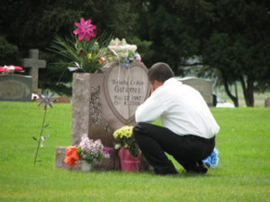 Joe Gutierrez visited the grave of his oldest daughter, Natasha, at Highland Cemetery on Memorial Day last year. Natasha died in 2005.