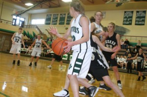 Rangely’s Audrey Hogan looked to make a pass during Saturday’s rivalry game against Meeker. In a battle for third place, Hogan scored a team-high 21 points and the Lady Panthers won 56-40.