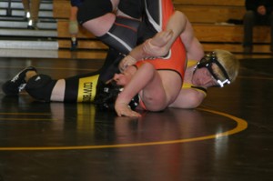Meeker senior Pat Love, wrestling at 152 pounds, pinned his opponent in the first period against Hayden.
