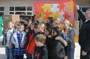 Jeff Burkhead Student council members from Meeker Elementary School visited the new school Feb. 24 and presented a thank-you puzzle to workers on the project.