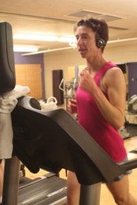 Sarah Ward, who registered for the Boston Marathon last fall and will run in the famous race this April, trains at the recreation center until warmer weather improves road conditions for running.