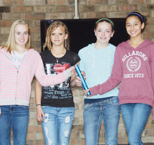 Barone Middle School eighth-graders Peyton Burke, Madison Russell, Halle Ahrens and Loran Casias broke long-standing school records in the 400- and 800-meter relays, two weeks ago in Rifle. The BMS team will run and jump in Eagle on Saturday.