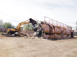 Last week’s demolition of what was popularly known as the Peacock Building on South Stanolind Avenue, where Peacock Oil Co. and several other businesses operated over the last six decades, marked the end of one era and the beginning of a new era in history. Owner Bud Striegel hopes to have an 80-by-180-foot steel building he plans to turn into a car museum on the site by August.