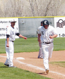 Panther head baseball coach Paul Fortunato congratulates senior Tobie Gasper as he rounds third base after hitting a home run to put his team on the scoreboard and start a comeback against Meeker. Rangely won the game 11-3 and will play Dolores on Friday at 8:30 a.m. in Delta.