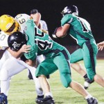 Rangely junior Ethan Allred (45) blocks for running back Lucas Heinle, who gained 85 yards rushing.