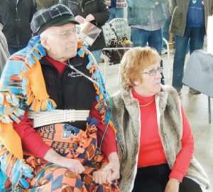 Gary, left, and Relda Coulter arrived back in Meeker last week from Craig, but Gary was completely surprised to show up at Meeker Airport on Saturday just in time for a small ceremony with about 80 persons to officially dedicate Coulter Field at the airport in his name. Coulter has been manager of Meeker Airport since 1959.