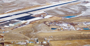 This is an aerial view of Coulter Field in Meeker with the hangars visible to the far left and the widened runway and taxiways visible on the right. The runway was widened from 60 feet wide to 100 feet wide, and it can now handle aircraft weighing up to 60,000 pounds, where the previous limit was 27,000 feet.