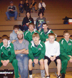 The Rangely Panthers wrestling team competed in Utah and eastern Colorado before the Christmas break to wrestle unfamiliar opponents and hope to take its success into 2014. Pictured at the 51st annual Bob Smith Invitational in Wray are, in front, Heath Peters, volunteer assistant coach Shad Peters, Lucas Heinle, Ryan Barlow and Ethan Allred. In back, Nych DeLeon, Ryan Wilczek and Caleb Lawson. The Panthers finished fourth as a team.