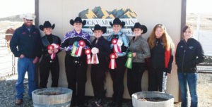 From left to right are members and instructors with the Colorado Northwestern Community College Horse Show team in Rangely and their winnings over the weekend: Dustin Davis (equine program director and instructor), Courtney Hibbs, Amanda Witcher, Tasha Gibson, Amber Parmley, Jamie Levin, Cristy Brinkley and Stacey Bailey (equine instructor and IHSA Horse Show team coach).