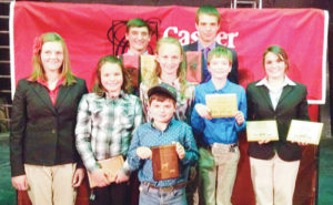 Members of the Rio Blanco Livestock Judging team show off some of the awards they have won in the past month from their competitions. In the back row, from left, are: Justin Mosher and Ty Dunham; middle row, from left: Samantha Lapp, Marryn Shults, Jilly Baumgartner, Macy Collins and Madi Shults; front row: Hayden Shults.