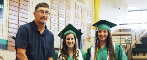 Jeff LeBleu, left, presented the award to Aimee Hogan and Tessa Slagle.
