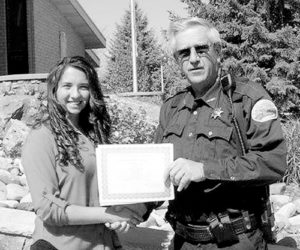 phSlageAcceptsSheriff'sScholarship