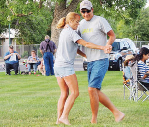 These two folks had no fears about dancing to the music of Felix y Los Gatos on Friday evening on the Meeker courthouse lawn. More than 200 people took in the concert, which was sponsored by the ERBM Parks and Recreation District. This was the first of the ERBM Parks and Recreation District-sponsored Friday evening concerts.
