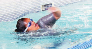 Ohana Mataia, pictured here in the swimming leg of the triathlon. Her teammates were Tai Mataia and Tala Atoafa.