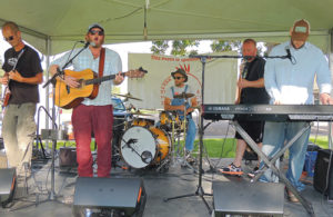 Entertainment was provided by Hotter ‘N Grits out of Winter Park on Saturday during the 50th Years of Wilderness celebration on the courthouse lawn in Meeker. The ERBM Parks and Recreation District sponsored the group, which had a couple hundred people enjoying the late afternoon sunshine. 