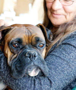 Angie Arnold and her dog Rosco P. Coltrane, named after the fictional character in the TV show "Dukes of Hazzard."