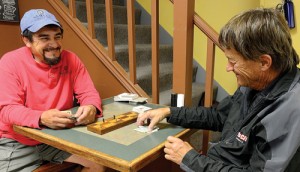 Bobby Gutierrez, left, and Steve Harman played cribbage last Thursday—a tradition at Wendll's Wondrous Things and Cuppa Joe in Meeker. Harman won, by the way, this time.