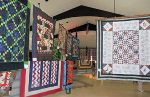 Meeker’s P.E.O. Chapter BA held its annual Quilt Show on Friday and Saturday at the Fairfield Center in Meeker, and there were more than 130 quilts on hand, embellished by some fine antiques. The quilt show’s Viewers’ Choice went to a quilt by Lee Light of Meeker, hanging above right, and a drawing was held for a quilt to give away, and that quilt was won by Bea Blanke of Meeker.