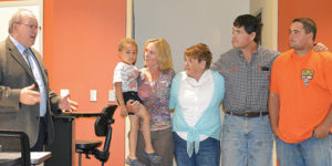 On hand for the dedication of the remodeled and expanded Rector Science Building on the Rangely campus of CNCC were, from left, CNCC President Russell George; Peggy Rector’s daughter-in-law, Rebecca Rector holding her nephew, Quinton; Peggy Rector; her son, Jeff Rector; and grandson, Brian Rector.