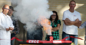 Thursday, the Rector Science Building was officially dedicated on the Rangely campus of Colorado Northwestern Community College. The ribbon cutting offered a twist. Peggy Rector said CNCC President Russell George gave the job of a “scientific ribbon cutting” to Dr. Jay, CNCC’s “Science Guy.”  Jay didn’t need scissors, just sugar and oxygen, and when the flame and smoke cleared, the ribbon was gone. About 220 people attended the barbecue and dedication. Speakers spoke of how important teamwork is in getting a task such as this building renovation done, and Rector said that if it wasn’t for the taxpayers, it wouldn’t have been possible.
