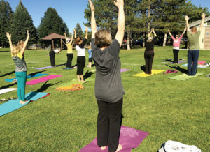 Rangely yoga instructor Tarrah Patch leads participants in ‘Yoga In The Park’ on a grassy expanse within Elks Park. The event celebrated National Yoga Month and kicked off a range of six-week classes Patch began teaching at the recreation center last week.