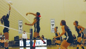 Meeker senior Paige Jones spikes the ball in a match against Vail Christian with teammates Maggie Phelan, Sydney Hughes and Jamie McLaughlin. The match took Meeker five games to win. Meeker will play in Paonia on Friday and host West Grand on Saturday at Meeker High School.