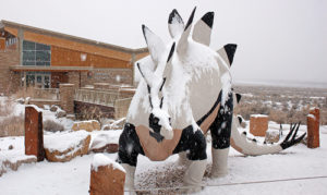 Looking a bit cold and lonely, this stegosaurus stands sentinel at the visitor center at Dinosaur National Monument. There hasn’t been a lot of snow at the lower elevations of Rio Blanco County, but measurable snow has been reported in the high country.