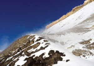 Strong wind blows the air up a slope near Chase Draw west of Rangely, cooling the air and condensing the moisture. The effect is of steam rising from the hillsides, although the actual result is called a “hill fog.” It is not a common occurrence, but the weather in the past week has created this phenomenon.