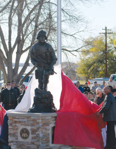 Veterans from World War II and the Korean War unveiled John Kobald’s “Sacrifice and Resolution” memorial for all Rio Blanco County veterans on Tuesday afternoon in Rangely.