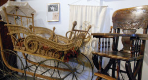 Pictured here are two of the favorite exhibits at the White River Museum in Meeker. Above is an 1887 high chair that was made into a stroller. Below is a two-headed calf born in 1934 with a rare birth defect. It lived for six hours. These are just a couple of the several hundreds of items on display seven days a week at the museum, which is currently holding a membership drive. 