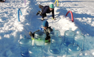 The ERBM Recreation and Park District’s Winter Entertainment Series took place this past weekend. There were games in downtown Meeker on Friday afternoon and Saturday morning at several of the parks around town. Above, a young gentleman, with a push from behind, gets ready to knock down 5-gallon water bottles set up as bowling pins.