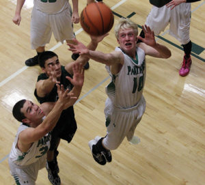 Panthers Colt Allred and Patrick Scoggins go up for a rebound against a Plateau Valley Cowboy during a home game, which the Panthers won 44-21. Rangely will travel to Paonia on Friday to play the Eagles in another league contest.