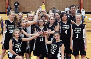 On Saturday both of the Barone Middle School girls’ seventh grade basketball teams won their respective tournaments. The seventh grade A and B teams were victorious with the seventh grade A team soundly defeating Moffat County by a 50-14 margin while the B team defeated Steamboat Springs in a low-scoring 21-11 contest. Members of the champion Barone Middle School girls seventh grade A and B basketball teams are: Back row, left to right: Caleigh Morlan, Jilly Bumguardner, Addie Joy, Sarina Goedert, Karlee Neilsen, Julia Dinwiddie and coach Tom Knowles. Middle row, left to right, are: Kirsten Brown, Madison Kindler, Makenna Burke, Lorena Martinez and Matilda Brown. Kneeling from left to right are: Annalise Amack and Jaydenn Archuleta.