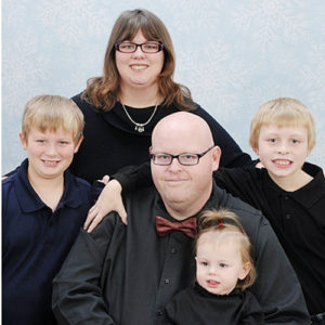 Pastor Shannon Brumfield, center, is the new pastor at Rangely Christian Church after a 13-month search. The pastor, who was raised in Ohio, is joined by his wife, Krystal, and three children, Gabriel, Nathaniel and Bethanie.