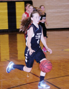 Barone Middle School eighth-grader Grace Bradfield dribbles down the basketball court during a game against the Glenwood Springs Demons, which BMS won 39-20. The Barone girls are still undefeated on the season after beating Craig Middle School by a 17-8 score on Saturday morning. Meeker will play host to the annual league tournament on Feb. 14.