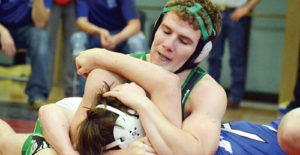 Ethan Allred, a 170-pound wrestler for Rangely High School, grapples with an opposing wrestler on the road in Ignacio over the weekend. Allred won two dual matches by forfeit and won all four of his Butch Melton Invitational Tournament matches by pinning each of his opponents.