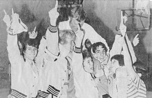 Coach Bill Turner pictured with one of his many winning wrestling teams.