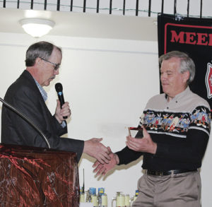At the annual Meeker Volunteer Fire and Rescue Banquet on Saturday night at the Fairfield Center in Meeker, retiring Fire Chief Steve Allen, left, recognized newly retired Vaughn Moodie for the 20 years of service with the department.