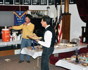 On Sunday, the masonic brothers of Rio Blanco Lodge No. 80, AF and AM, held their annual celebration of George Washington’s birthday with food, refreshment and a dessert auction. The proceeds of the auction go toward scholarships for local high school graduates to attend in-state schools. George Washington was initiated into Freemasonry in October 1752, at the age of 20 and by August of the following year was raised to Master Mason. Although there were many masons during our nation’s founding years, George Washington is held by many as one of the finest examples of duty to God, our nation, our neighbors and ourselves. This year marks the 125th anniversary of the charter for Meeker’s Rio Blanco Lodge No. 80 and members look forward to a new year of brotherly love, truth and charity. Left, friends and Masons celebrate George Washington’s birthday as auctioneer Paul “Buckshot” Sheridan and Danny DeWitt help the Masons support local scholarships.
