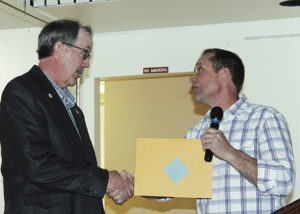 Chairman of the Board of Meeker Volunteer Fire and Rescue Wade Bradfield, right, presented retiring Meeker Fire Chief Steve Allen an award of appreciation for his long service to the town of Meeker and the department during the department’s annual banquet on Saturday night. Allen served as fire chief in Meeker from 1999 to 2015.