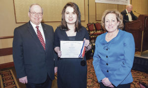 Present in Denver on March 11 to help Colorado Northwestern Community College sophomore Marina Mecham be inducted into the All-Colorado Academic Team for Phi Kappa Theta, the national honor society for two-year colleges, were, from left, CNCC President Russell George, PTK inductee Marina Mecham and Colorado Community College System President Dr. Nancy McCallin.